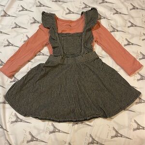 Pinstriped pinafore dress and rose coloured shirt